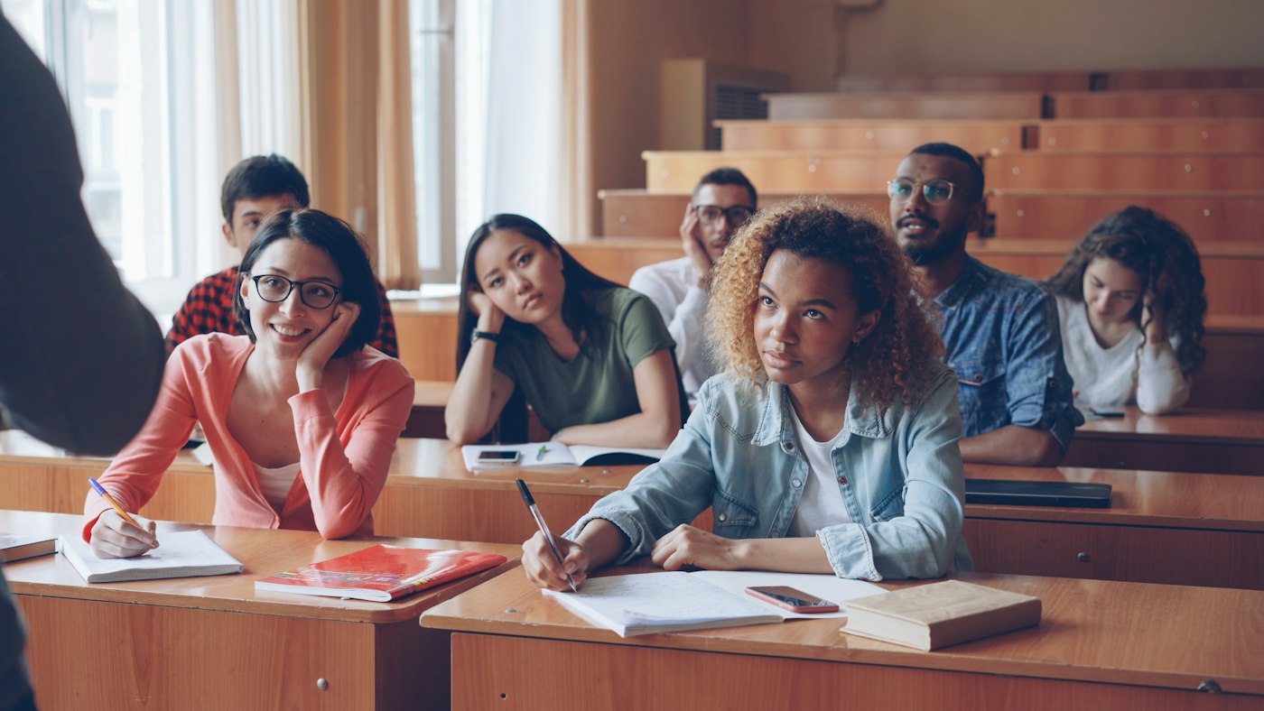 Students listening attentively during an exam preparation class
